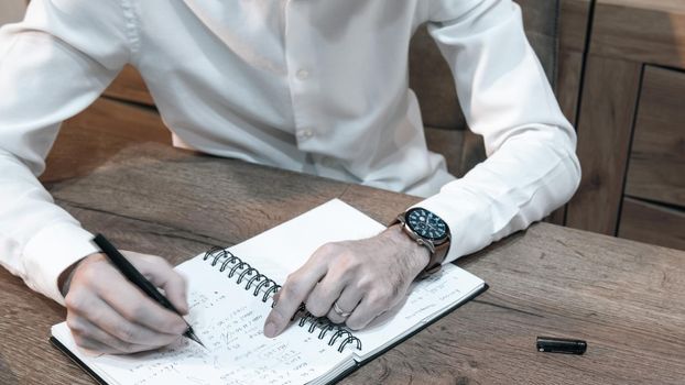 Businessman Working Late Reading Archive Documents and sign documents