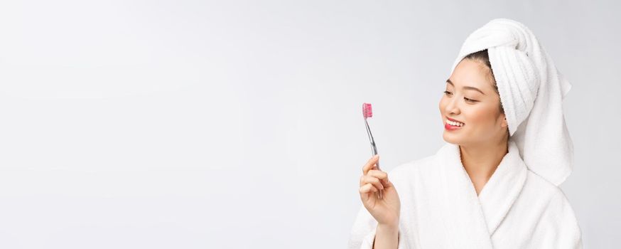 Close up of Smile woman brush teeth. great for health dental care concept, Isolated over white background. asian