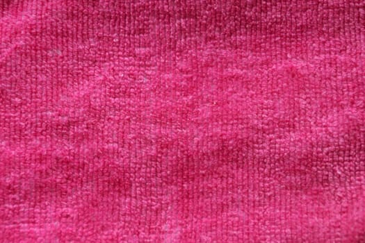 pink terry cloth for textile background close-up