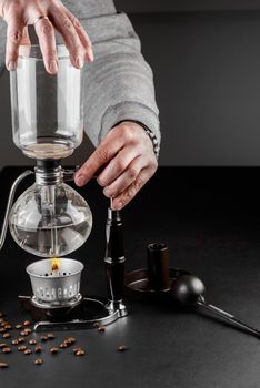 Syphon alternative method of making coffee. coffeemaker is a manual pour-over style glass. Cofee brewing