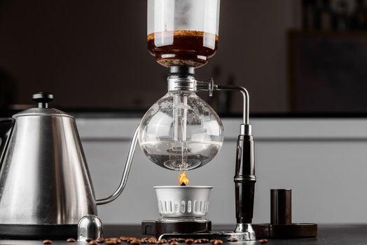 Syphon alternative method of making coffee. coffeemaker is a manual pour-over style glass. Cofee brewing