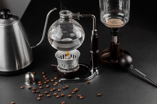 Syphon alternative method of making coffee. coffeemaker is a manual pour-over style glass. Cofee brewing