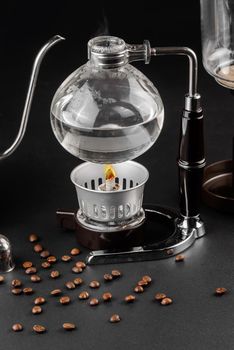 Syphon alternative method of making coffee. coffeemaker is a manual pour-over style glass. Cofee brewing