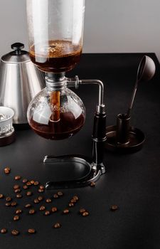 Syphon alternative method of making coffee. coffeemaker is a manual pour-over style glass. Cofee brewing