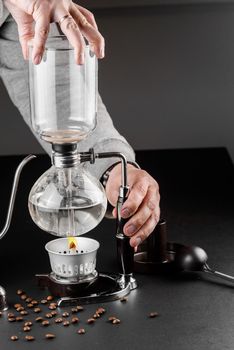 Syphon alternative method of making coffee. coffeemaker is a manual pour-over style glass. Cofee brewing