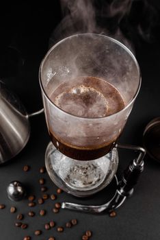 Syphon alternative method of making coffee. coffeemaker is a manual pour-over style glass. Cofee brewing