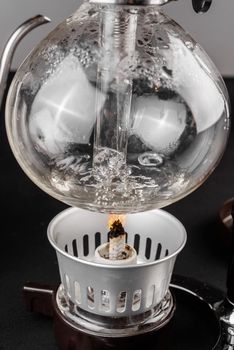 Syphon alternative method of making coffee. coffeemaker is a manual pour-over style glass. Cofee brewing