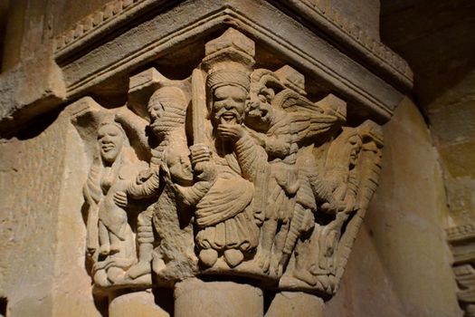 Soria, Spain; 26 September 2012: Stone sculpture on the capital of a column in the monastery of San Juan de Duero