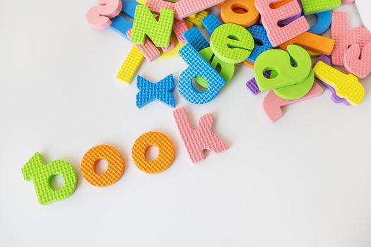 Multicolored letters. Letters for the study of children in kindergarten or school, fluted letters. Book lettering