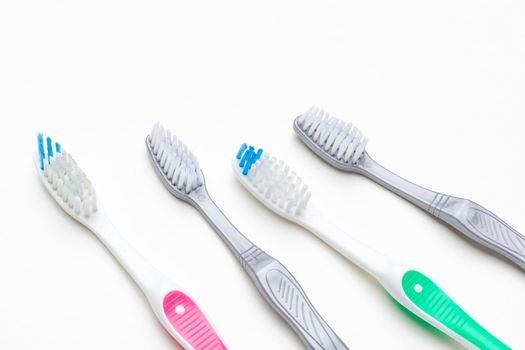 Flat lay composition with manual toothbrushes on color background, close up. creative photo.