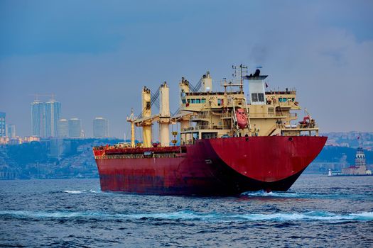 Large cargo ship in in Bosphorus Strait, Istanbul, Turkey.
