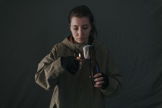 Ukrainian woman with molotov standing for her country