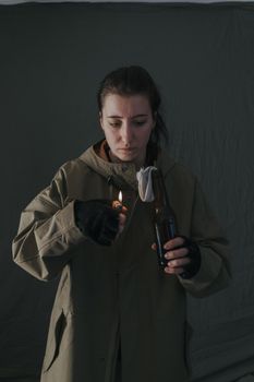 Ukrainian woman with molotov standing for her country