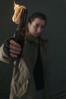 Ukrainian woman with molotov standing for her country