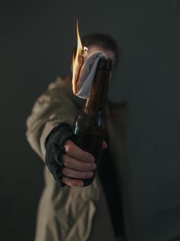 Ukrainian woman with molotov standing for her country