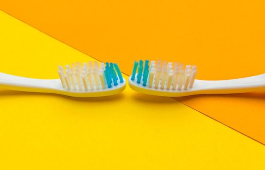 Flat lay composition with manual toothbrushes on color background, close up. creative photo