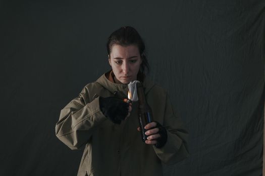 Ukrainian woman with molotov standing for her country