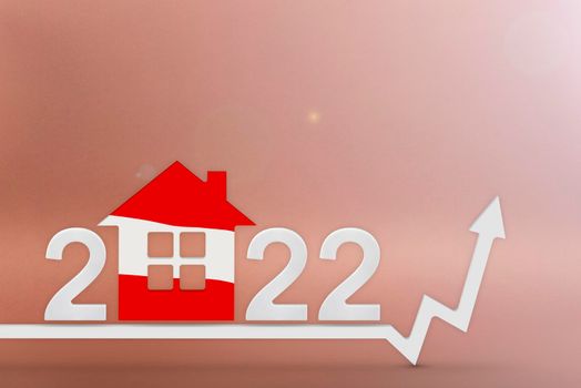The cost of real estate in Austria in 2022. Rising cost of construction, insurance, rent in Austria. House model painted in flag colors, up arrow on red background.