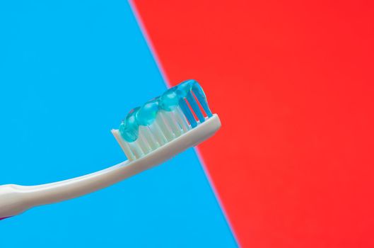 Flat lay composition with manual toothbrushes on color background