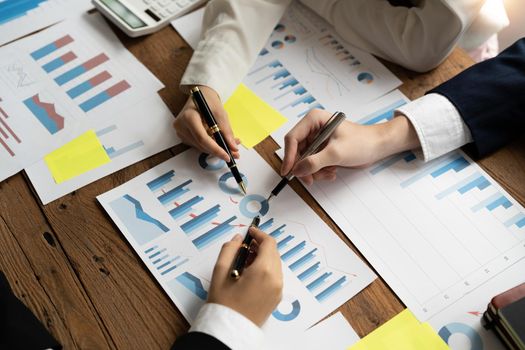 Close up Business people meeting to discuss the situation on the market. Business Financial Concept.
