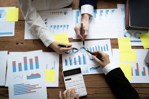 Close up Business people meeting to discuss the situation on the market. Business Financial Concept.