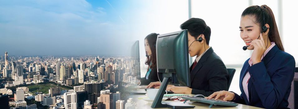 Business people wearing headset working in office in widen view to support remote customer or colleague. Call center, telemarketing, customer support agent provide service on telephone video call.