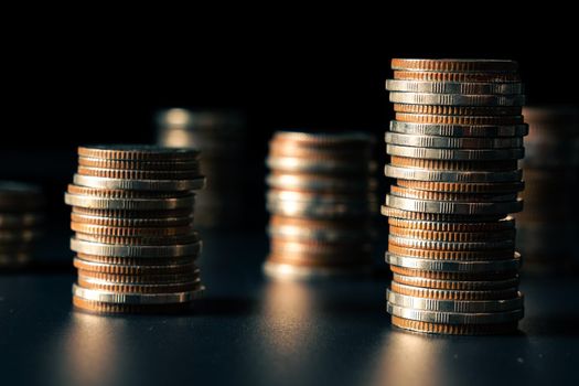 Pile of gold coins stack in finance treasury deposit bank account for saving . Concept of corporate business economy and financial growth by investment in valuable asset to gain cash revenue profit .