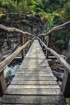 Beautiful wooden hand-made bridge in the Ecopath White River, near Kalofer, Bulgaria. Nature preservation while giving people access is the goal.