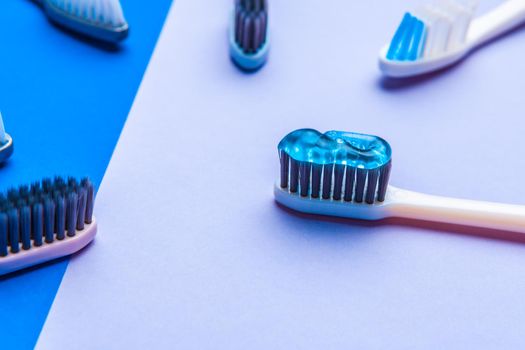 Flat lay composition with manual toothbrushes on color background, close up. creative photo.