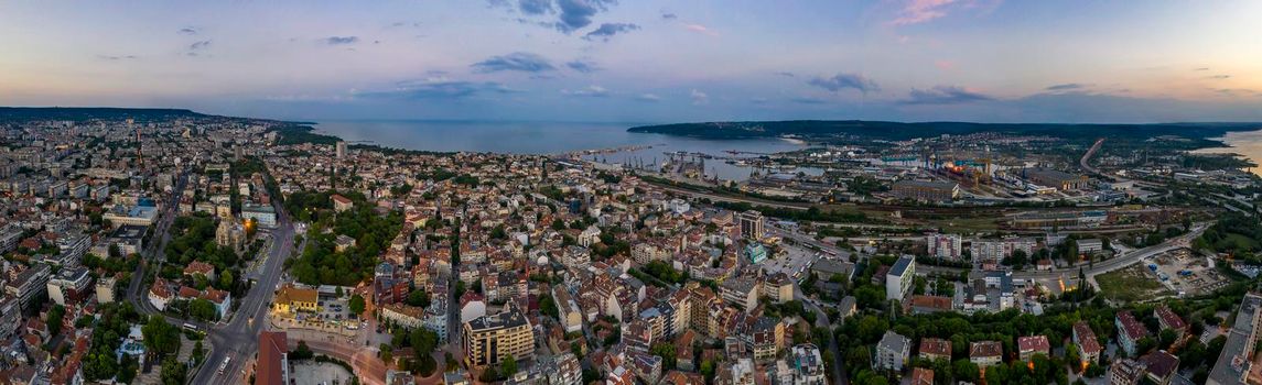 Varna, Bulgaria - May 30, 2019: Amazing detail aerial panorama of Varna city, bay and lake at sunset