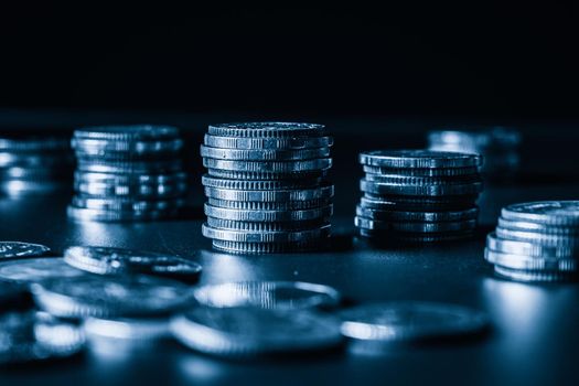 Pile of gold coins stack in finance treasury deposit bank account for saving . Concept of corporate business economy and financial growth by investment in valuable asset to gain cash revenue profit .
