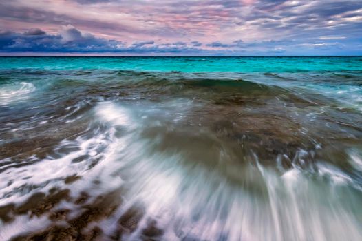 Amazing scenic seascape with motion blur and flowing waves.