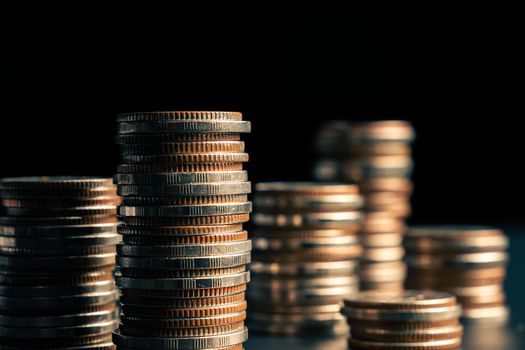 Pile of gold coins stack in finance treasury deposit bank account for saving . Concept of corporate business economy and financial growth by investment in valuable asset to gain cash revenue profit .