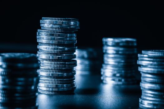 Pile of gold coins stack in finance treasury deposit bank account for saving . Concept of corporate business economy and financial growth by investment in valuable asset to gain cash revenue profit .