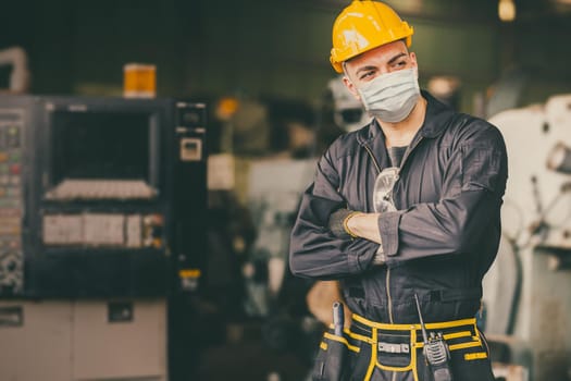 Industry engineer man male worker wear face mask during service working in factory to prevent Covid virus air dust pollution and for good healthy.