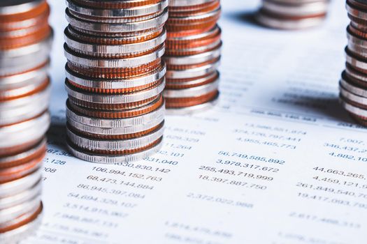 Pile of gold coins stack in finance treasury deposit bank account for saving . Concept of corporate business economy and financial growth by investment in valuable asset to gain cash revenue profit .