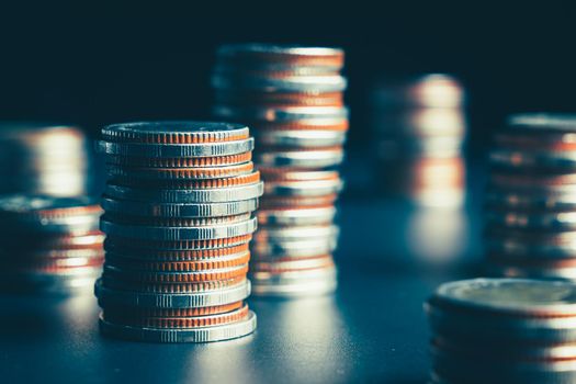 Pile of gold coins stack in finance treasury deposit bank account for saving . Concept of corporate business economy and financial growth by investment in valuable asset to gain cash revenue profit .
