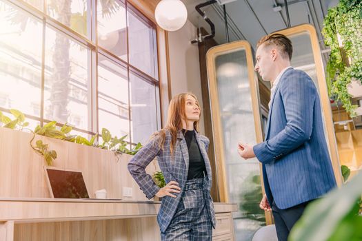 Businesspeople talking together in modern office green plant decoration for business contact or connection meeting.