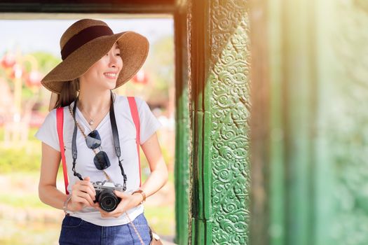 girl teen travel happy smile, Asian women tourist walking with hat backpack bag and camera