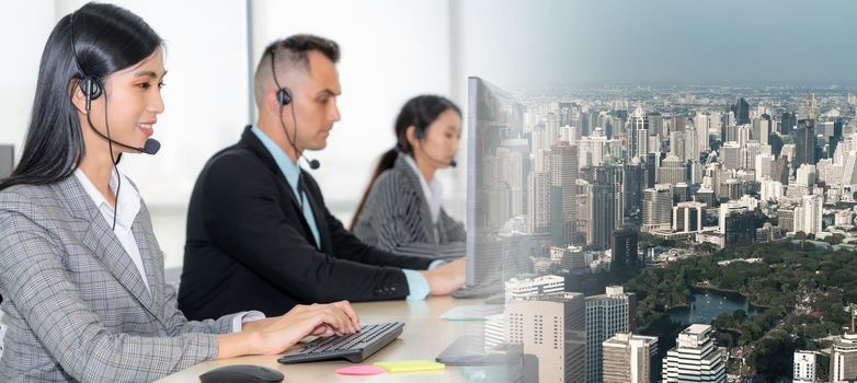 Business people wearing headset working in office to support remote customer or colleague. Call center, telemarketing, customer support agent provide service in broaden view .