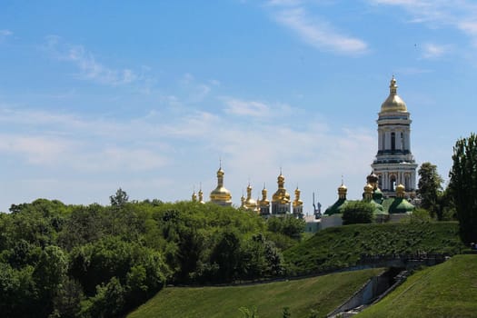 View of the hills of the Kiev-Pechersk Lavra on a sunny day. High quality photo