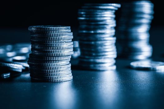 Pile of gold coins stack in finance treasury deposit bank account for saving . Concept of corporate business economy and financial growth by investment in valuable asset to gain cash revenue profit .