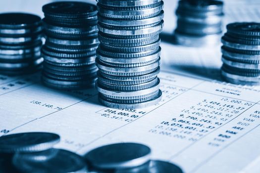 Pile of gold coins stack in finance treasury deposit bank account for saving . Concept of corporate business economy and financial growth by investment in valuable asset to gain cash revenue profit .