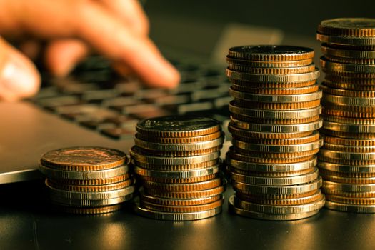 Pile of gold coins stack in finance treasury deposit bank account for saving . Concept of corporate business economy and financial growth by investment in valuable asset to gain cash revenue profit .
