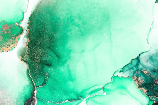 Green gold abstract background of marble liquid ink art painting on paper . Image of original artwork watercolor alcohol ink paint on high quality paper texture .