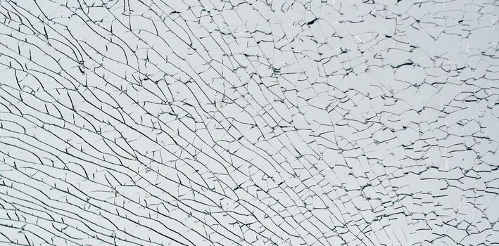 broken broken glass under the bottom crack under the diagonal abstract photo. High quality photo