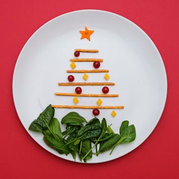 Funny edible Christmas tree, Christmas breakfast idea for kids. Beautiful Christmas and New Year food background top view