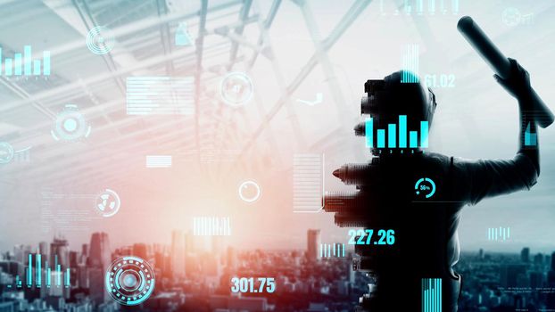 Future building construction and inventive engineering project concept with HUD hologram graphic design. Building engineer, architect people or construction worker works with modern civil technology.