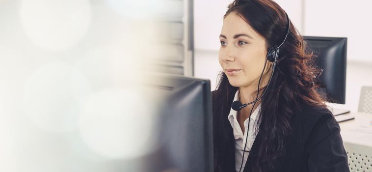 Business people wearing headset working in office to support remote customer or colleague. Call center, telemarketing, customer support agent provide service in broaden view .