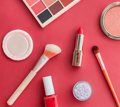 Beauty, make-up and cosmetics flatlay design with copyspace, cosmetic products and makeup tools on coral background, girly and feminine style concept